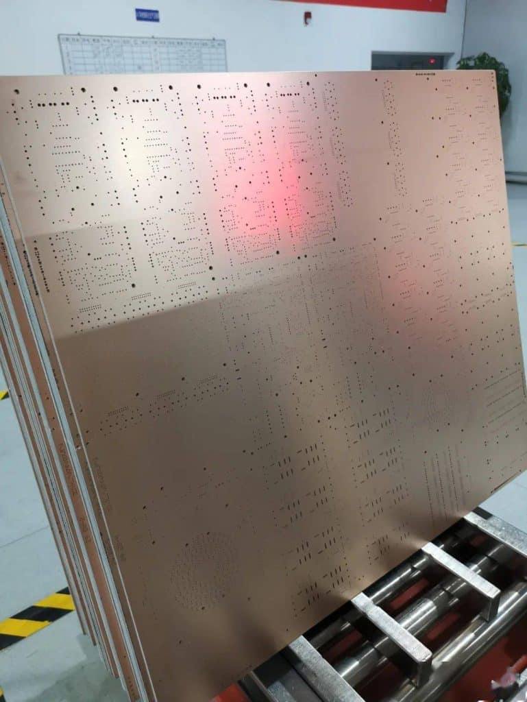 Figure 3-2. The copper-clad laminate boards that just came from the drilling process were covered in holes.